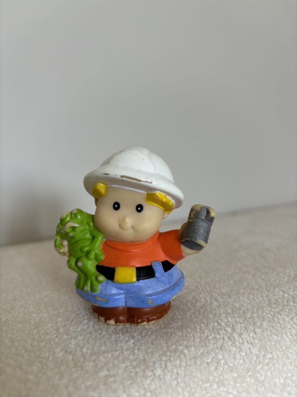 Little people boy with frog